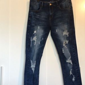 Distressed denim pants